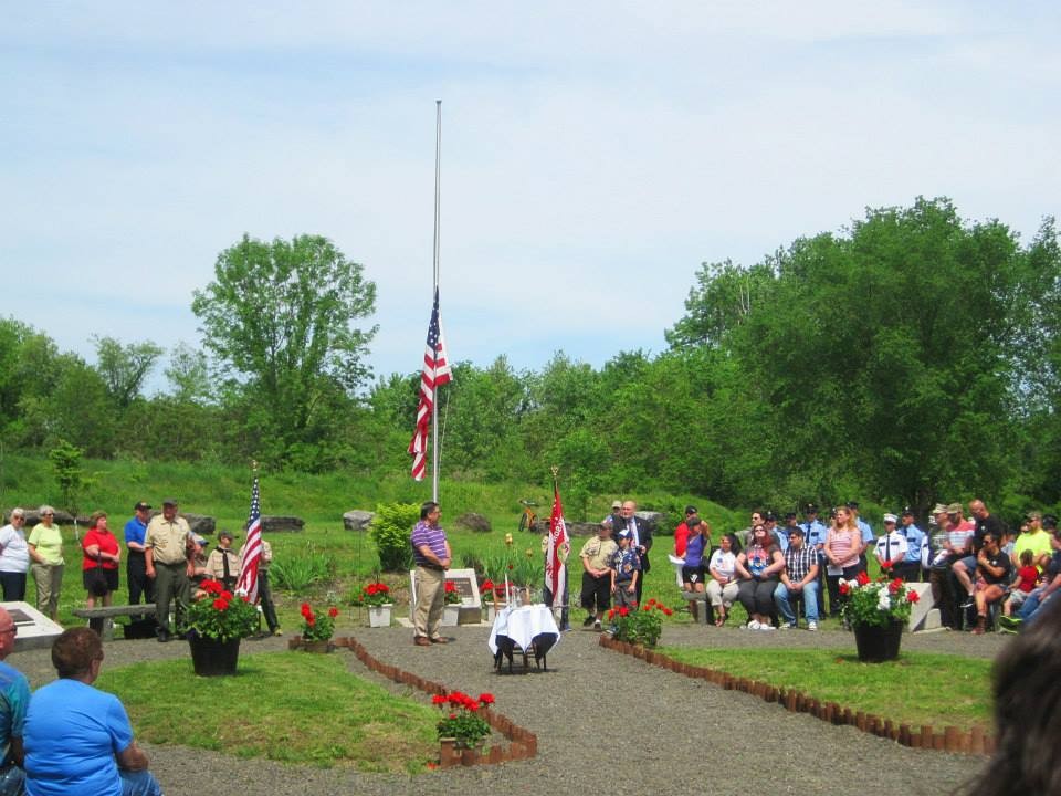 Rondout Valley School District Superintendent Rosario Agostaro speaking at the Veterans Park ceremony dedicated to local hero Sgt. Shawn M. Farrell  II, a graduate of Rondout.