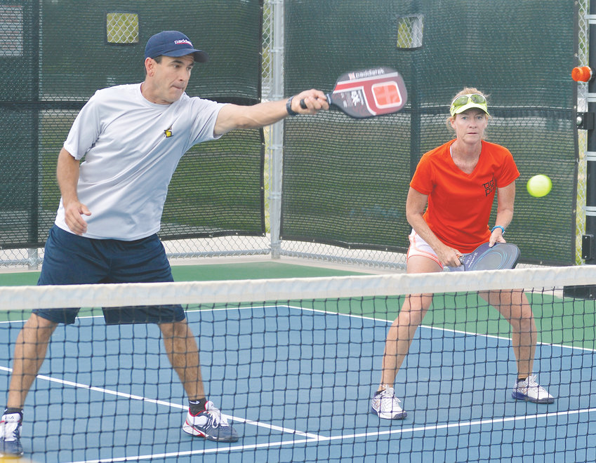 Donnie Gallegos (left) and his wife Patty are 4.8 mixed doubles players that play in many of the local and regional pickleball tournaments. Donnie claims pickleball can be competitive. "You have beginners and then you get super serious and super competitive players like any other sport," he said..