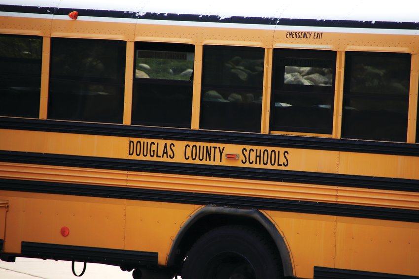 A school bus sits outside Clear Sky Elementary School on Aug. 17 as students’ first day back in school during the 2020-21 school year came to a close.