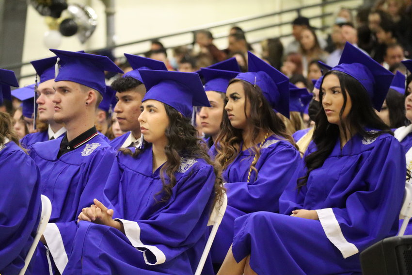 Seniors listen to keynote speakers during the 2022 graduation ceremony.