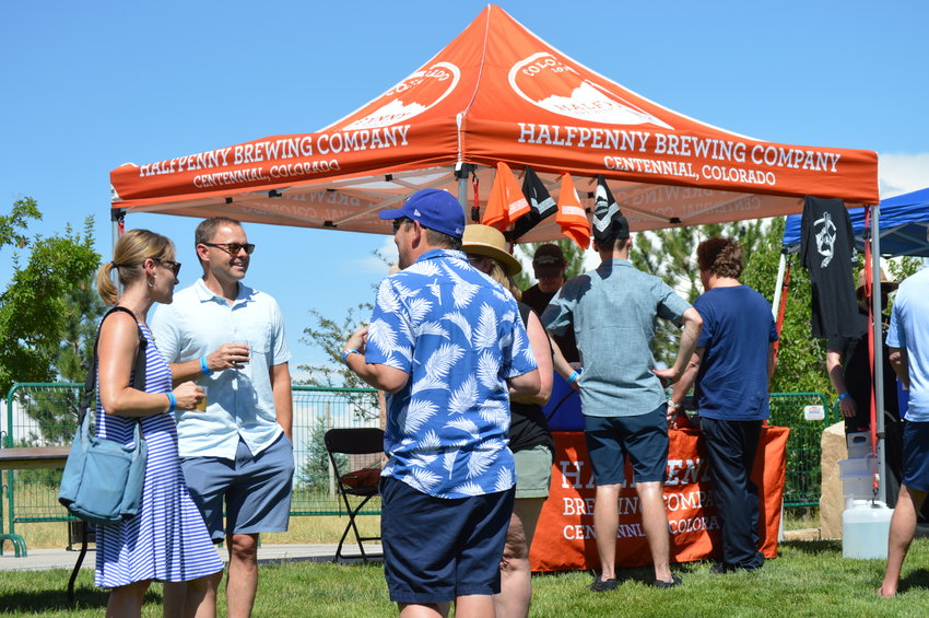 People enjoyed beer samplings during Centennial's annual "Brew-N-Que" event on July 9, 2022, at Centennial Center Park.