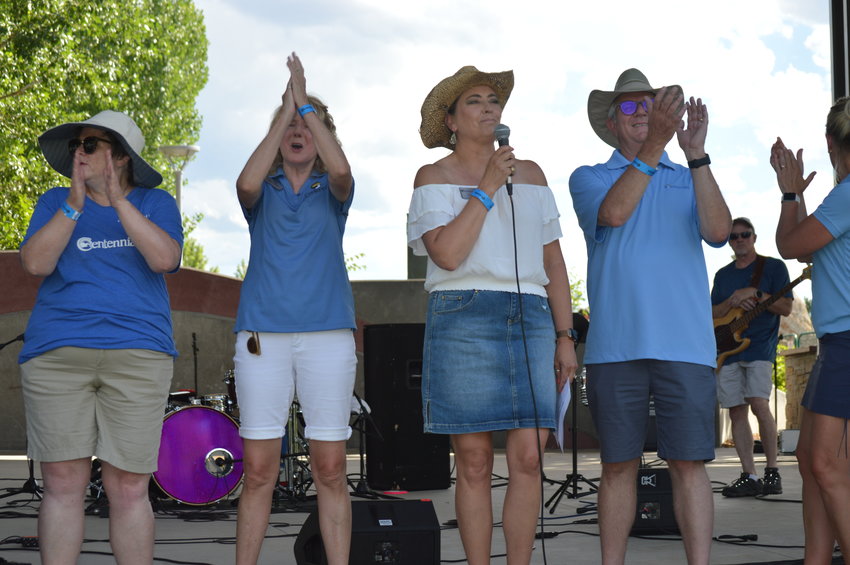 Centennial city council members cheered in celebration of the city's sixth "Brew-N-Que" event on July 9, 2022, at Centennial Center Park.