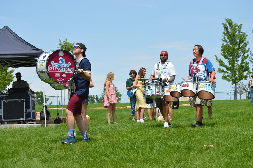 The Colorado Avalanche Celly Squad marched through Centennial Center Park during “The Perfect Playlist” concert on July 31, 2022.