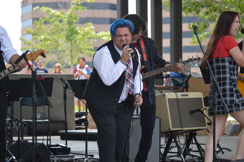 Tristan Shiflett was one of the main singers who performed during the School of Rock’s setlist at “The Perfect Playlist” concert at Centennial Center Park on July 31, 2022.