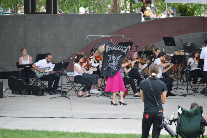 The Arapahoe Philharmonic concluded its performance with a cover of Metallica’s “Enter Sandman” on July 31, 2022, at Centennial Center Park.