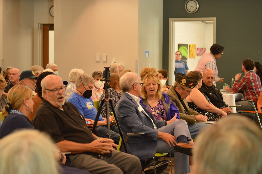 An estimated 165 people — including several Centennial city council members, Arapahoe County Sheriff Tyler Brown and Colorado House District 37 representative Tom Sullivan — attended Jason Crow’s town hall event at Koelbel Library in Centennial on Aug. 22, 2022.
