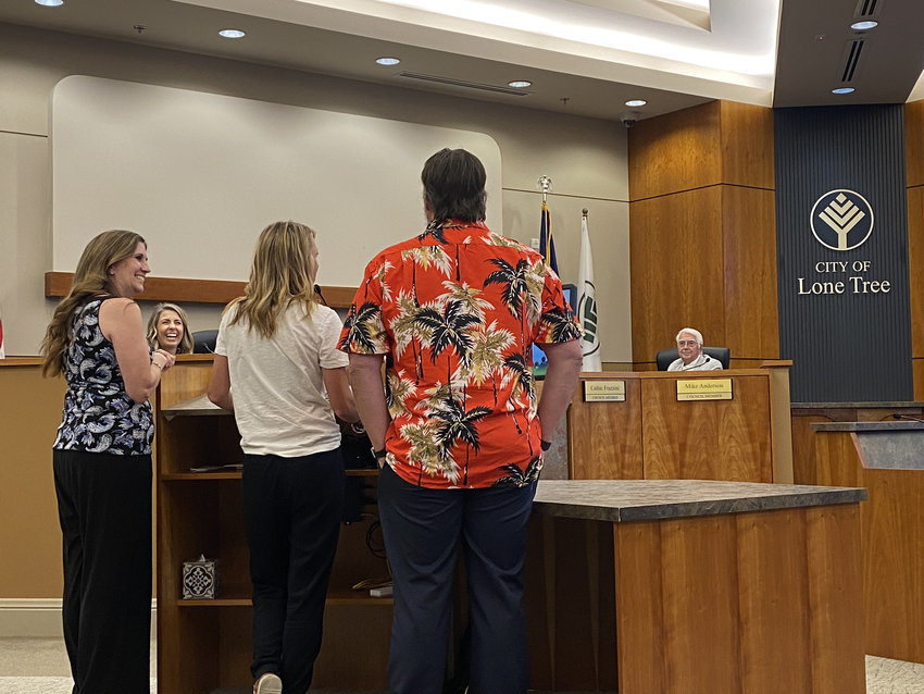 Erin Kane, left, Mindy Persichina, center, and Doug Humphreys presenting to Lone Tree City Council on Sept. 6, 2022.