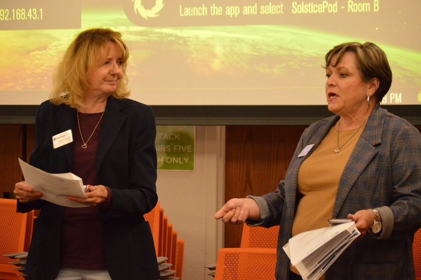 Centennial city council members Christine Sweetland, right, and Tammy Maurer, left, presenting at the Sept. 28 meeting at Koelbel Library.