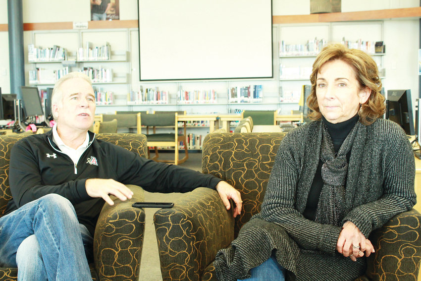 Bruce Beck, stepfather of Lauren Townsend, and Dawn Anna, her mother, speak to the media in the Columbine Hope Memorial Library recently. The Lauren Townsend Memorial Wildlife/Scholarship Fund was started in honor of Lauren Townsend.