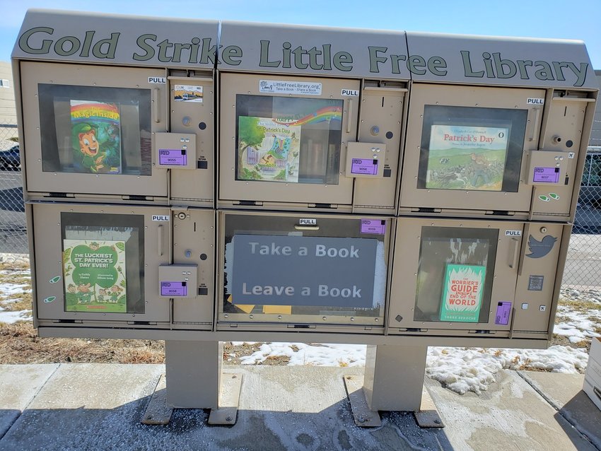 The Gold Strike Station Little Free Library adorned with Saint Patrick's Day Decoration.