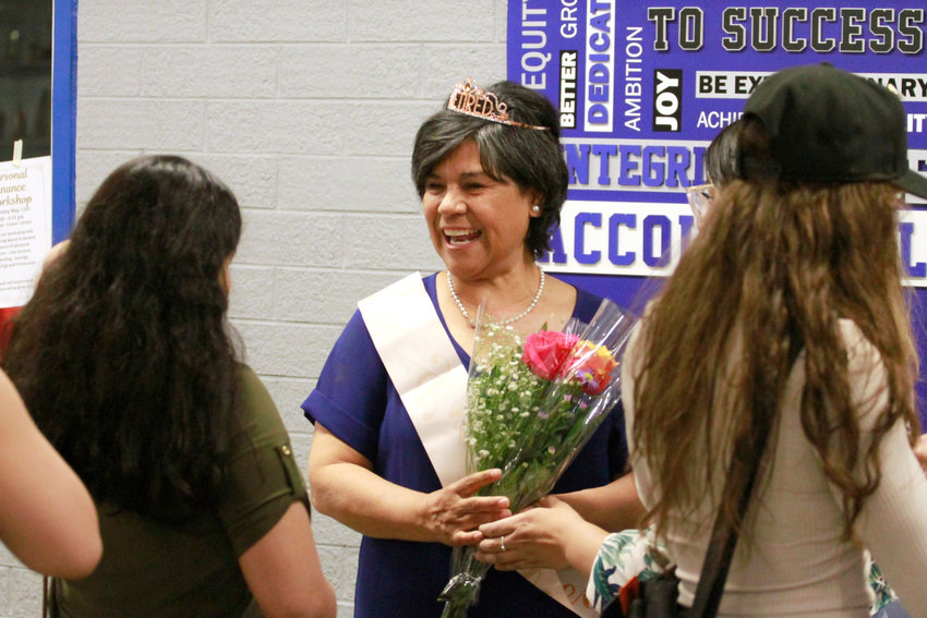 Angeles Navarro catches up with members of the community during a May 6 honoring her 31 years as a teacher in the Weld Re-8 School District.