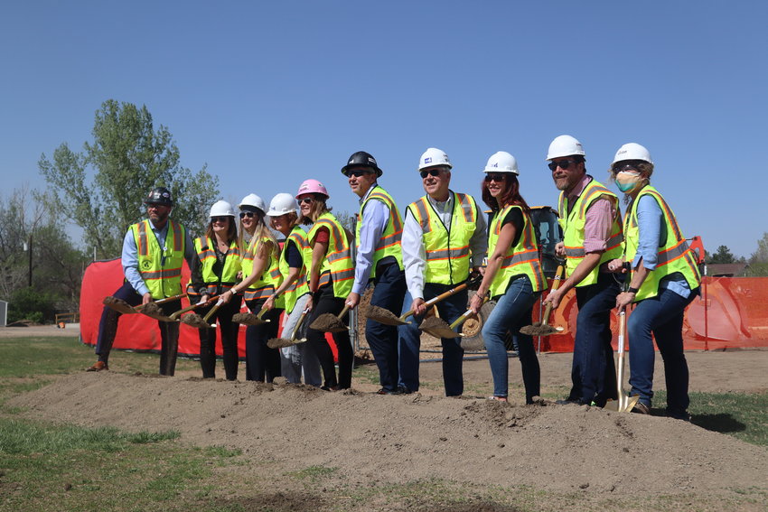 District leaders raise their shovels as they break the ground on what is expected to be a $35 million to $38 million project.