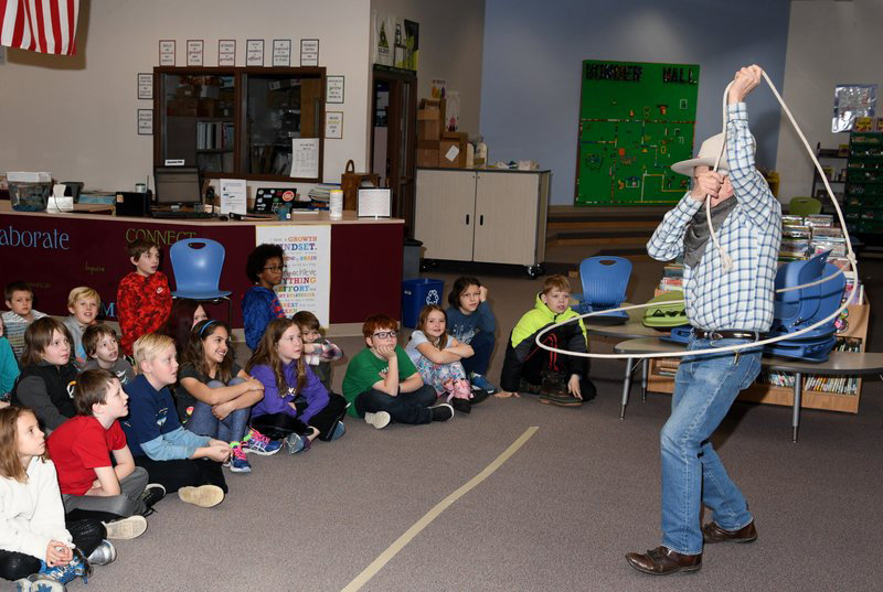 A cowboy demonstrates fancy rope tricks for a local elementary school. The Colorado Cowboy Poetry Gathering was among 29 grant recipients from the Golden Civic Foundation.