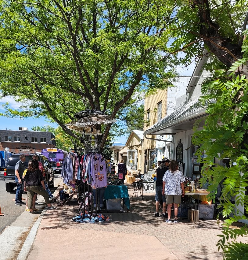 Local crafters and artists sell their wares along 73rd in front of A Creative Corner shop in Westminster.