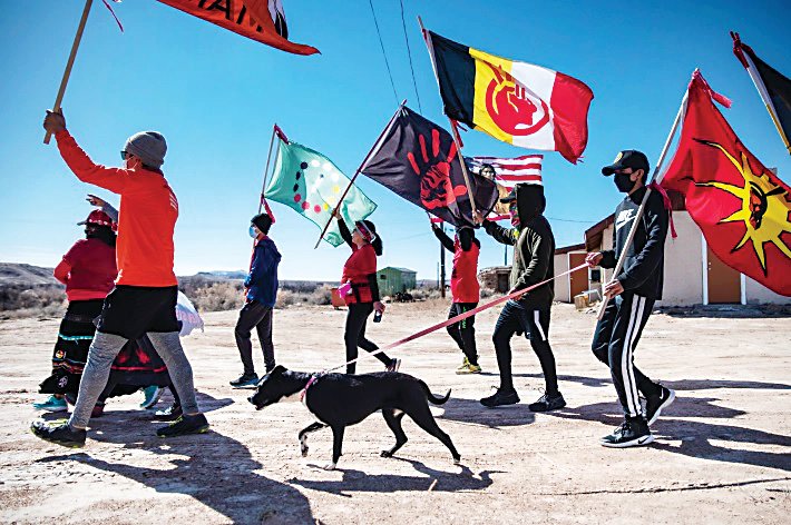 Participants conclude the Four Corners Prayer Run on Feb. 27 in Bluff, UT. Runners and walkers, many of Native descent participated in a relay-style run measuring a total of 232 miles through four states. The Prayer Run was organized to spread awareness of Indigenous women, men and elderly who face violence or go missing.