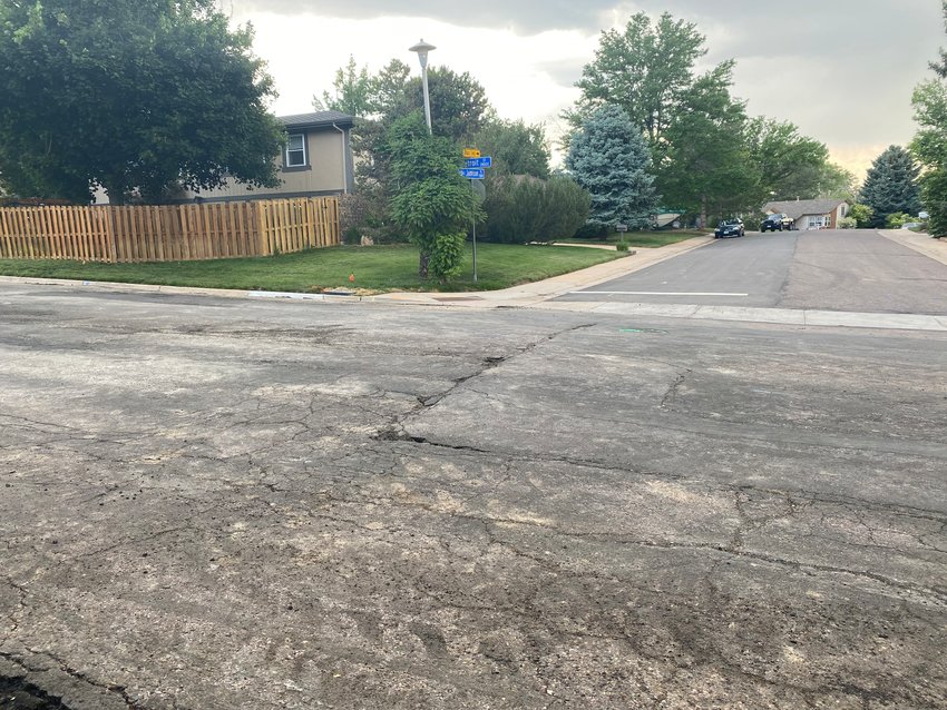 Damage from the water main break was visible on South Detroit Street, at the intersection with East Jamison Place, on June 17.