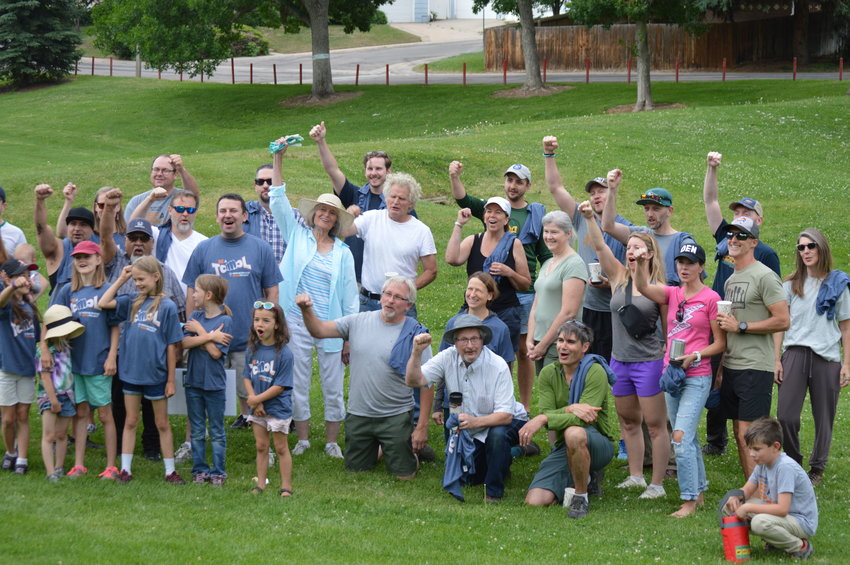 About 50 volunteers cheered, &quot;I'm a tool,&quot; at the start of Englewood's Day of Service event on June 18, 2022. The volunteers first met at Rotolo Park before dispersing to their assigned volunteer projects.