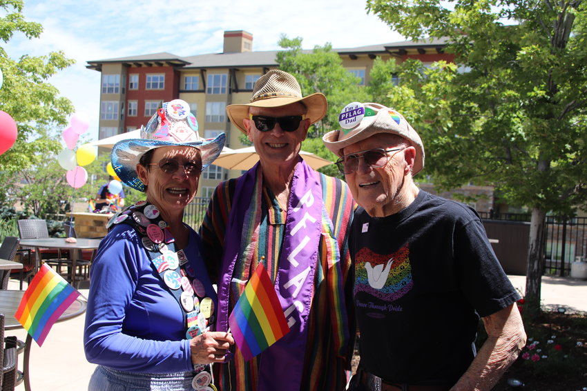 Jim Genasci, on right, celebrates Pride on Thursday at Wind Crest with Ray Vanoski and SJ Light, who wears a sash and cowboy hat featuring buttons collected at various Pride events since 1983 by Genasci's late wife, Jeanne.