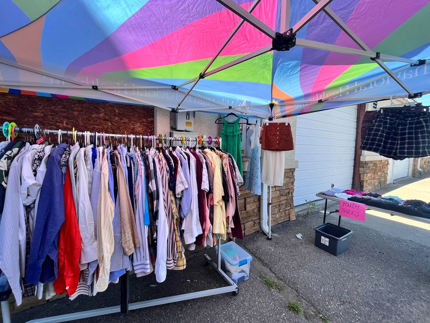 Marsha's Closet, located at the Transgender Center of the Rockies, offers free clothes. On June 15, 2022, clothes were displayed under a colorful tent outside in the back of the center as part of the closet's one-year anniversary celebration.