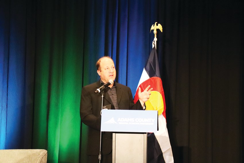 Governor Jared Polis addresses the State of the Region for Adams County.