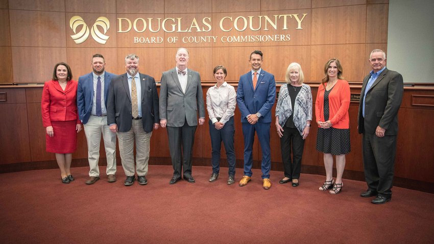 Douglas County Commissioners, members of the Highlands Ranch Metro District, South Suburban Parks and Recreation and Douglas County School District come together to celebration the official agreement to sell Toepfer and Sweetwater parks.