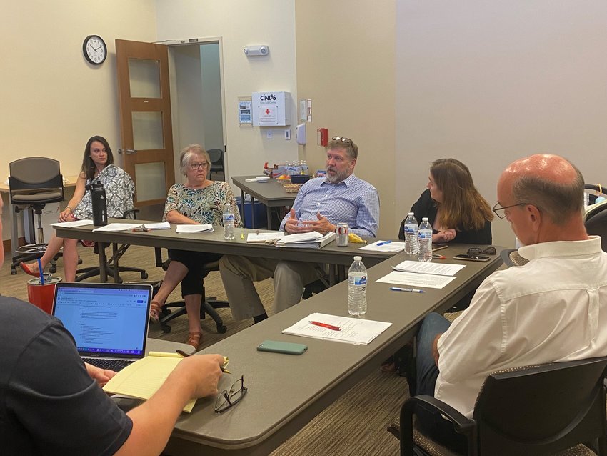 Douglas County School Board President Mike Peterson speaks at the retreat on Aug. 6 at the Legacy Campus in Parker. Board members met in the first of a two-part retreat to discuss trust and norms.