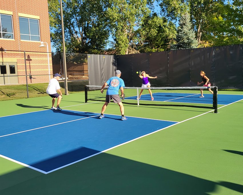 Players compete in a friendly pickleball game on Aug. 24 at the newly-opened outdoor courts in Highlands Ranch at the Westridge Recreation Center.