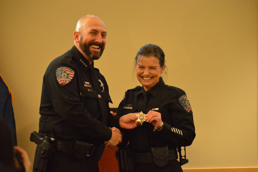 Arapahoe County Sheriff Tyler Brown, left, and Bureau Chief Laurie Halaba flashed bright smiles after Halaba was sworn in Jan. 24 at the Arapahoe County Sheriff's Office.