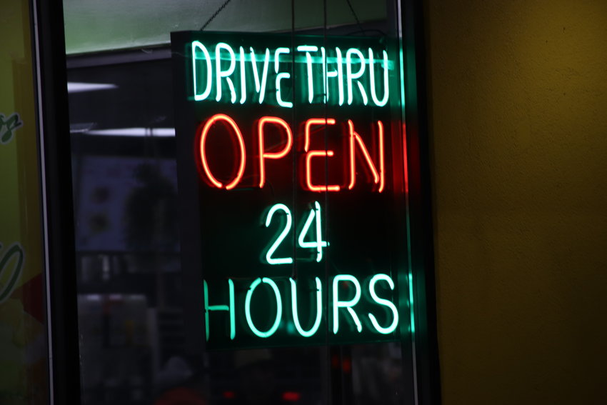 A sign is lit up at Alvarado's Mexican Fast Food, one of several Mexican restaurants open 24/7 in the Denver metro area.
