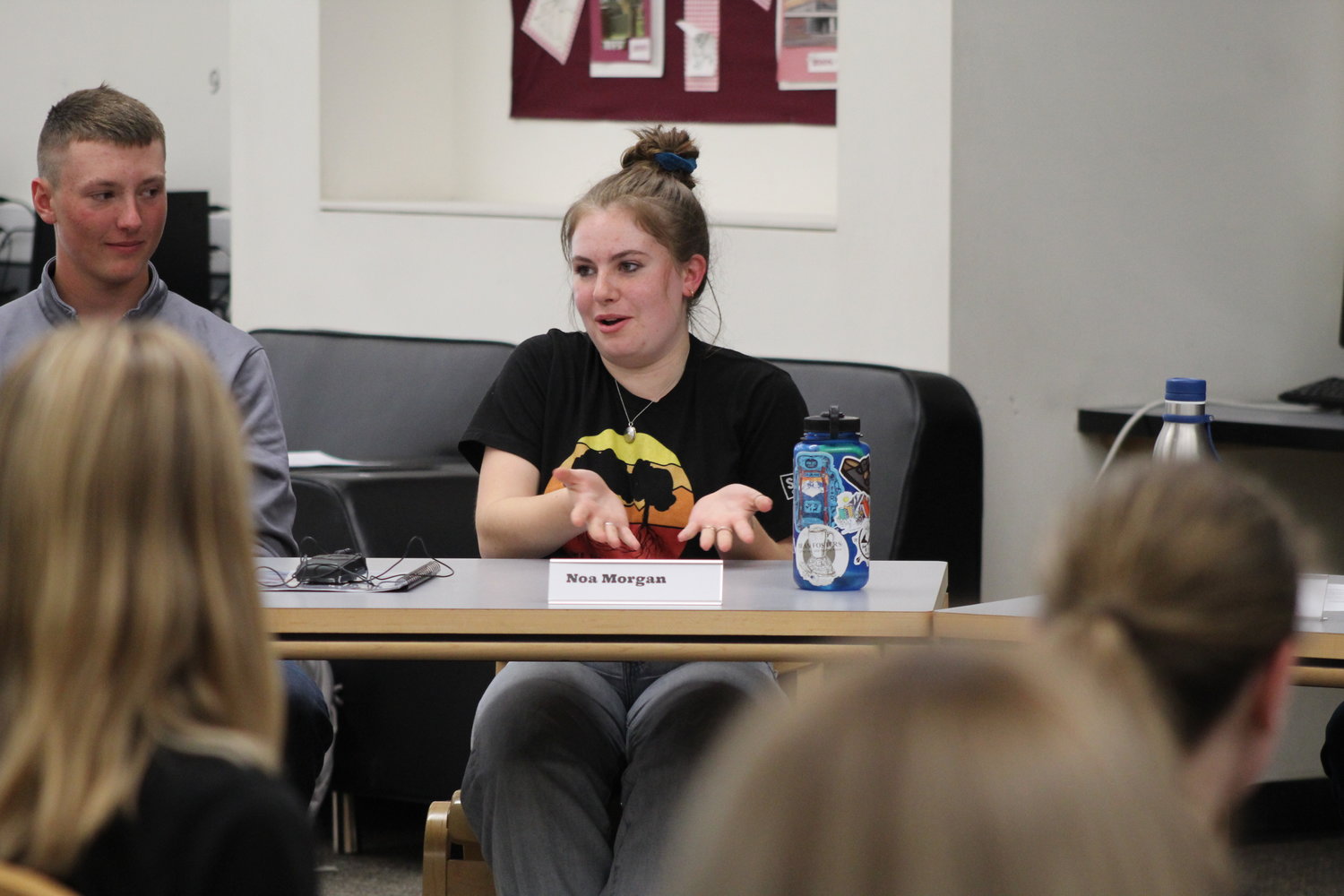 Golden High School freshman Noa Morgan discusses student mental health and the program Sources of Strength, which the school implemented in 2011, during a roundtable with the Colorado Attorney General's Office May 24 at GHS.