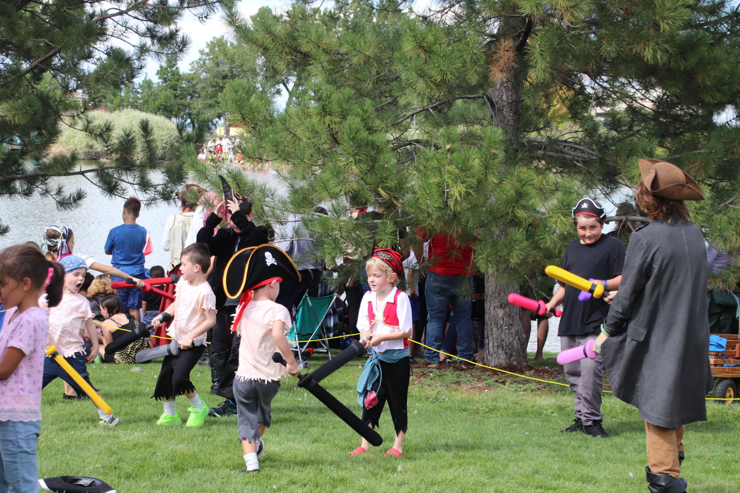 Small pirates engage in sword battles at Northglenn&rsquo;s 2022 Pirate Fest.