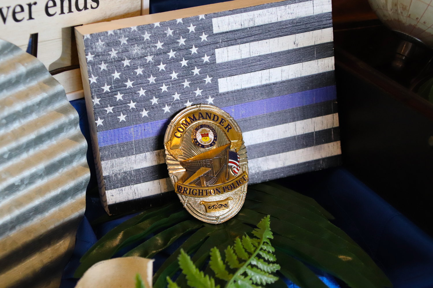 Brighton police Cmdr. Frank Acosta's last badge was on display outside of his funeral Sept. 29 at Henderson's Orchard Church.