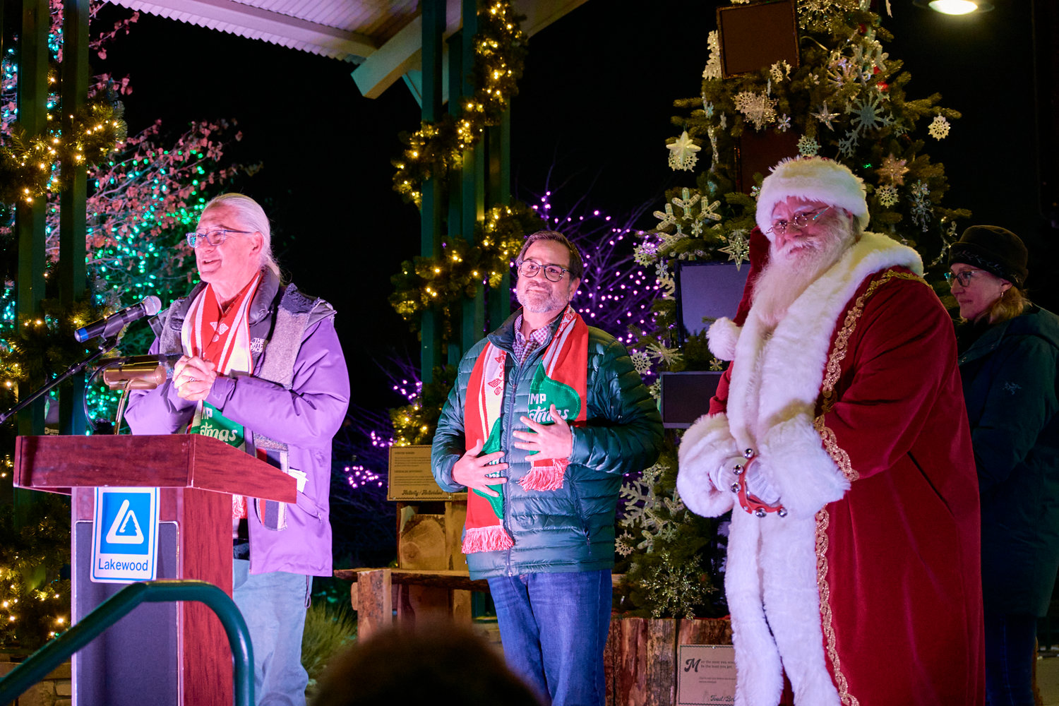 Lakewood Mayor Adam Paul at the annual mayoral tree lighting ceremony with Camp Christmas creator Lonnie Hanzon and Santa Claus.