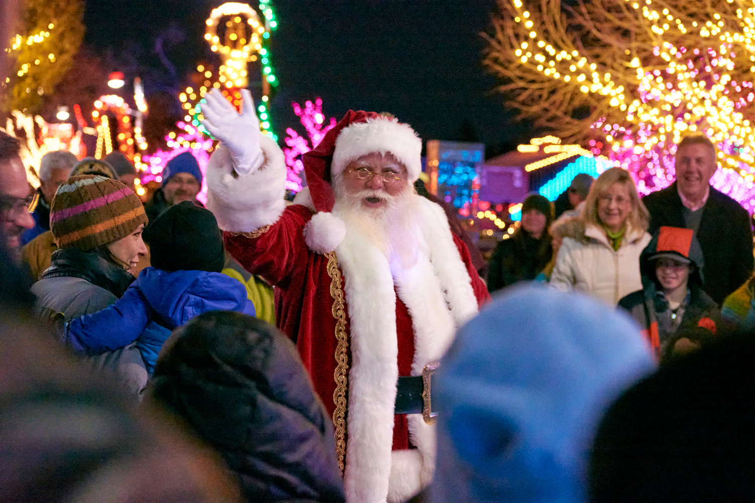 Santa Claus greets visitors on opening night of Lakewood's 2022 Camp Christmas.