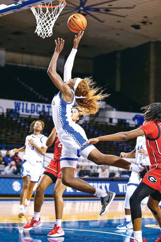 FORMER BRADLEY CENTRAL standout Rhyne Howard dropped in 30 points to lead No. 21 Kentucky's upset of 15th-tranked Georgia Thursday, as she moved into third place in the all-time 'Cats scoring list.