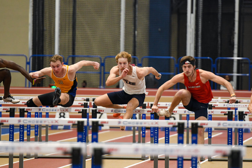 LEE UNIVERSITY'S Caleb Long set a Flame record with 4,218 points in the heptathlon at the Vanderbilt Invitational Saturday, in Nashville.