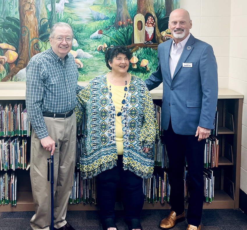 Fred Wood, left, former dean of humanities at CSCC, and Suzanne Wood, former director for the Early Childhood Education Program, are pictured with Bill Seymour, CSCC president.