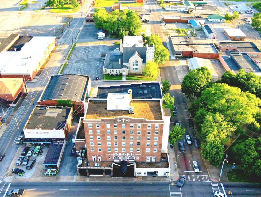 THIS AERIAL view from a drone shows the former Cherokee Hotel, which the city of Cleveland is marketing for development. The landmark building was constructed in 1929. It was closed during the 1960s and served as low-income housing until 2020.