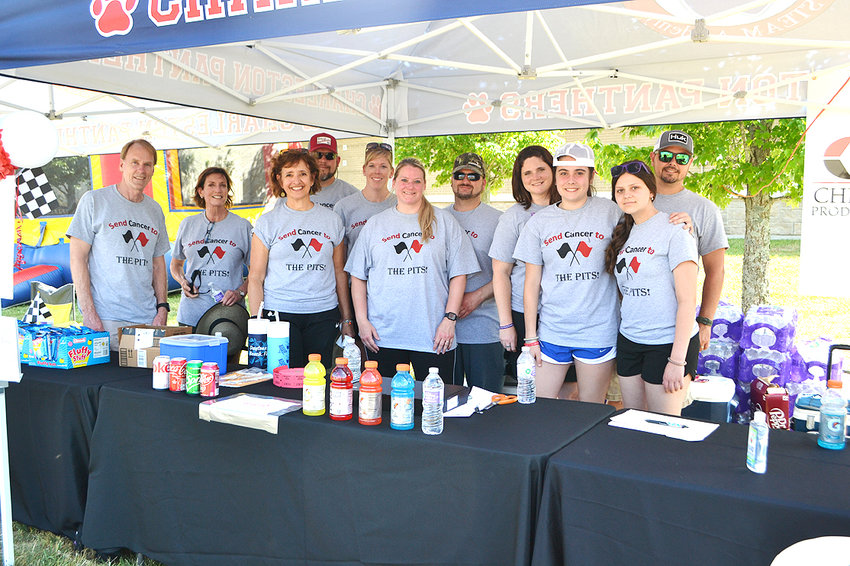 THE OLIN RELAY FOR LIFE team had one of the largest groups at this year&rsquo;s event, and sported T-shirts with the theme &ldquo;Send Cancer to the Pits,&rdquo; appropriate for the Relay&rsquo;s theme Racing for a Cure.