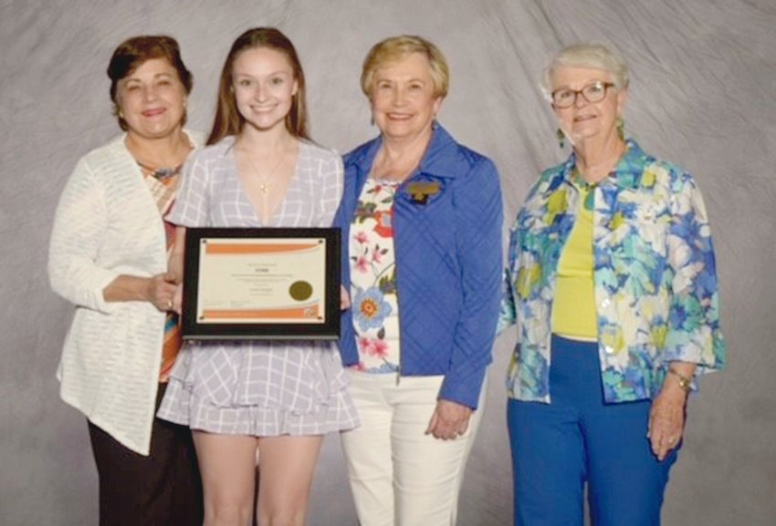 Peggy Pesterfield, third from left left, Cleveland City Board of Education, District 4, accompanied by Bonnie Humphreys, left, and Janie Bishop, right, presented Leah Hargis with the scholarship.