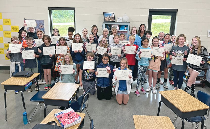 Fifth grade students at Black Fox Elementary School participated in the 2021-22 DAR American History Essay Contest. This year&rsquo;s topic was the 100th anniversary of the Tomb of The Unknown Soldier, and the importance of remembering those who gave their lives to serve our nation. Members of the Ocoee Chapter of the Daughters of the American Revolution presented certificates and American flags to the participants. Kim Fisher is the principal.