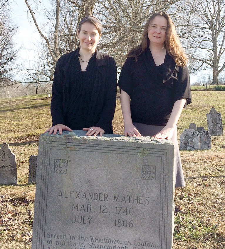 CAM, LEFT, AND MEG GUY, daughters of Larry and Phyllis Guy of Benton, recently visited the Salem Presbyterian Church in Limestone, where they saw the burial site of Capt. Alexander Mathis (1740-1806), an American patriot who fought in the Revolutionary War. The girls are ninth-generation, removed, daughters of Mathis. Their father, Larry, is a Vietnam veteran and a member of the Sons of the American Revolution.