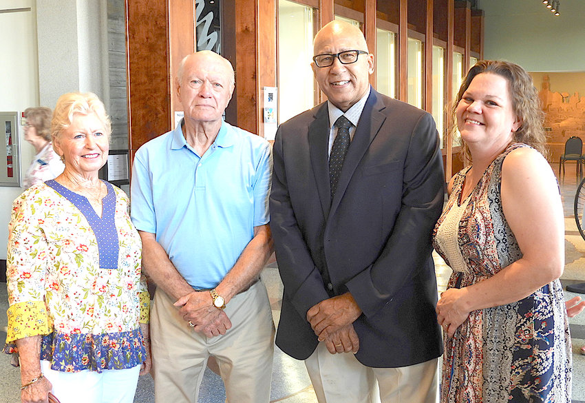 CALVIN SNEED, second from right, received a special recognition from the Ocoee Chapter of the Daughters of the American Revolution for his concern for the historic Dobbs Ford Bridge in Bradley County. Special guests at the ceremony for Sneed were Robert and Kay Dobbs, left, who are attempting to find out if they might be related to those who the bridge is named after, and Tonya Brantley who contacted Sneed with the Dobbs&rsquo; inquiry.