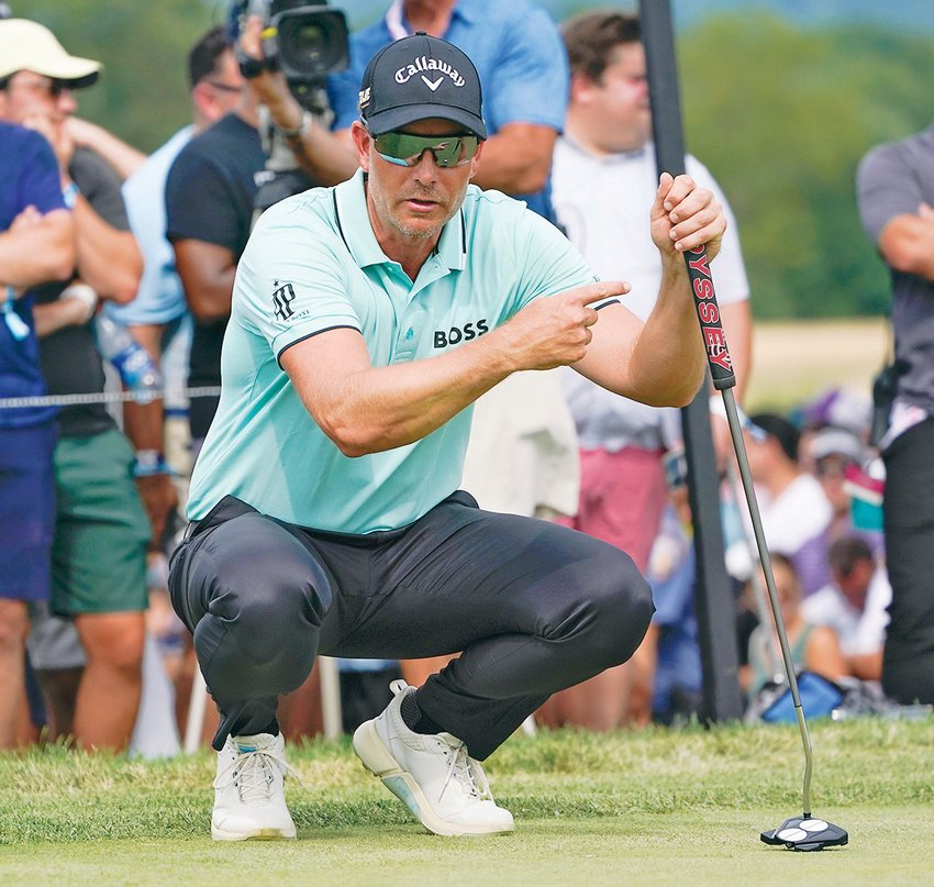 HENRIK STENSON, of Sweden, gestures on the 10th hole during the final round of his victory at the Bedminster Invitational LIV Golf tournament,  Sunday.