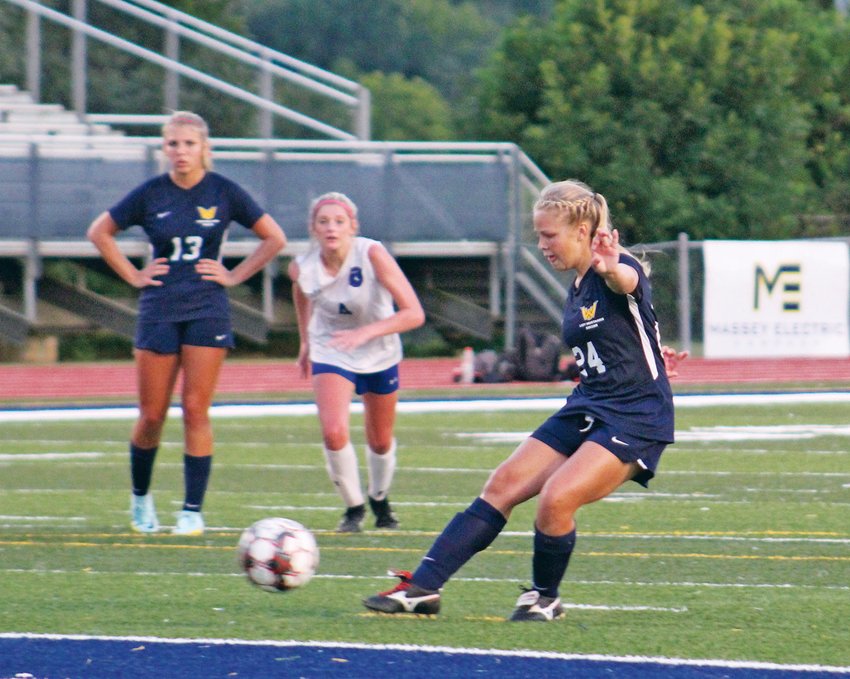 WALKER VALLEY'S Lyla Sims (24) attempts a penalty kick in the second half against Cleveland Tuesday evening. Sims's penalty kick goal put the Lady Mustangs on the board and helped secure a 2-0 District 5-AAA victory over the Lady Raiders.