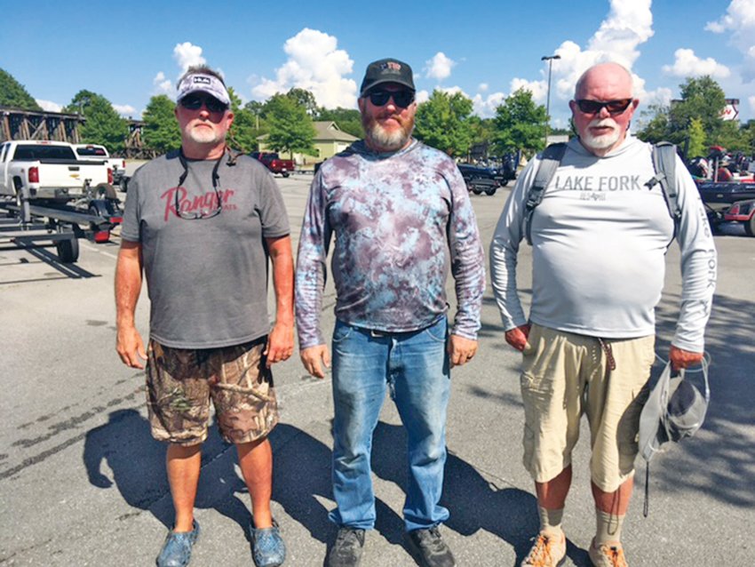 THE CLEVELAND Bassmasters winners from last weekend's tournament on Lake Nelly Henry, near Gadsden, Alabama, were  , from left, Harrison Simms, first place, Roger Graham Jr., second place and George Corbit, third place and big fish.