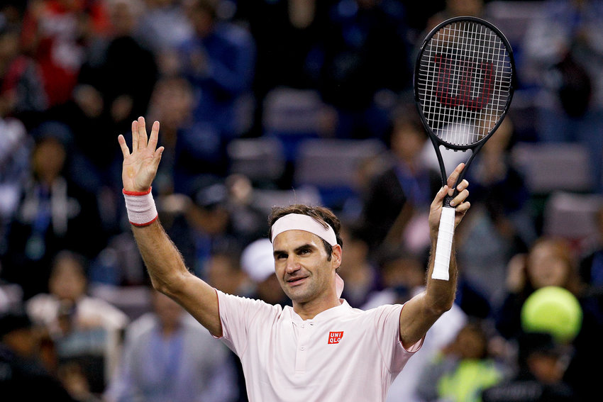 Roger Federer of Switzerland waves to spectators after defeating Daniil Medvedev of Russia in their men's singles match of the Shanghai Masters tournament at Qizhong Forest Sports City Tennis Center in Shanghai, China, Oct. 10, 2018. Federer announced Thursday he is retiring from tennis.
