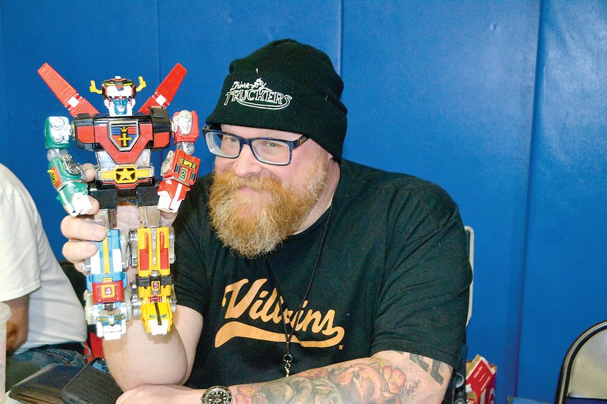 CLEVELAND GEEKSTER founder Rob Alderman, who created the event with friends Ryan Faricelli and Ashley Raburn, shows off his &ldquo;inner Geekster&rdquo; with his original Voltron that he had been seeking for years.