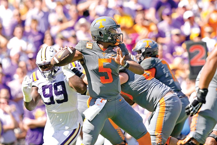 TENNESSEE QB Hendon Hooker (5) fires a pass during the first half of Saturday's 40-13 whipping of No. 25 LSU, in Baton Rouge, La.