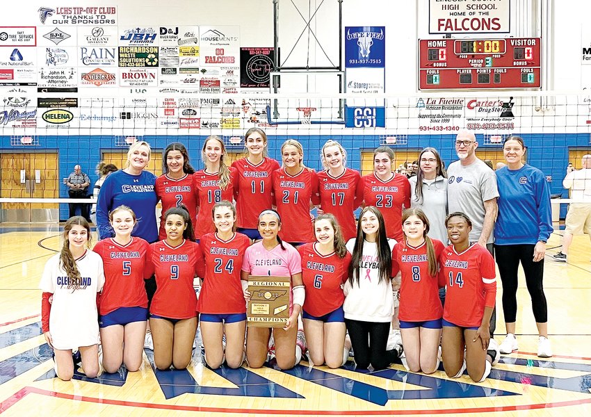 THE CLEVELAND volleyball team celebrates its Region 3-AAA tournament championship following its win over Bradley Central in the tournament final at Lincoln County High School Tuesday night. The Lady Raiders won 3-0 over the Bearettes to win the region title.